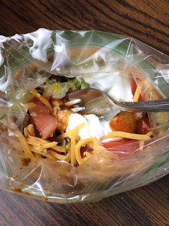 A picture of Taco in a bag.