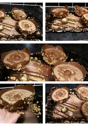 A picture of Edible Ferrero Rocher Cup With Mousse Chocolate Drizzle And Ferrero In Middle.