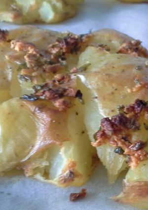 Foto principal de Patatas chafadas al horno