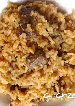 Una foto de Arroz con asadura de cordero