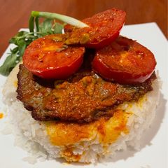 A picture of Pan Kebab with Tomato & Rice Crust.