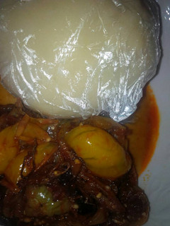 A picture of Garden egg Soup & Pounded yam.