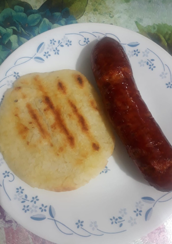 Una foto de Arepas de maíz trillado