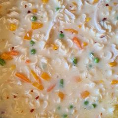 A picture of Creamy chicken and noodle soup.