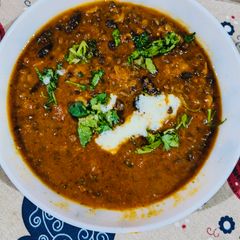 A picture of White butter + Black beans Dal makhani.