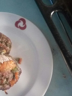 A picture of Vegetable stuffed orange beef.