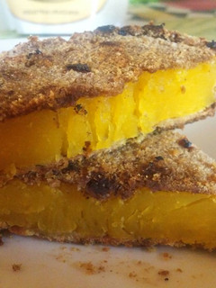 Una foto de Milanesas de calabaza y de papa