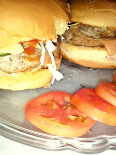 A picture of Chicken burger with fusion sauce.