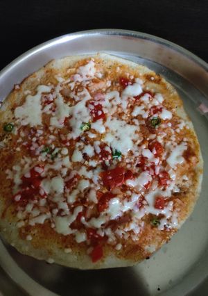 A picture of Veg Cheese dosa.