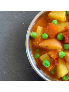 A picture of #Gujarati-style pea, potato and tomato #vegan #curry.
