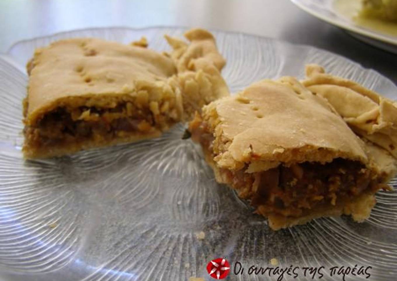Eggplant pie with onions and anthotyro