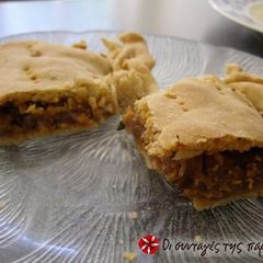 A picture of Eggplant pie with onions and anthotyro.