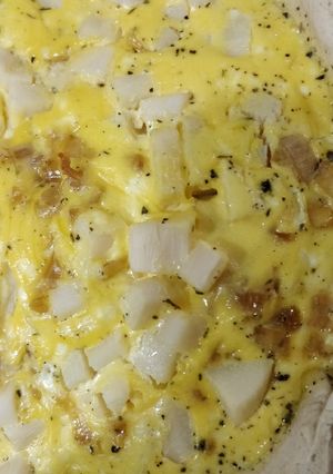 Una foto de Quiche de palmitos, poro caramelizado y queso de cabra