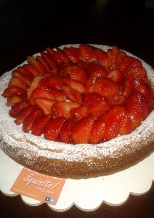 Una foto de Exquisito cheesecake con fresas