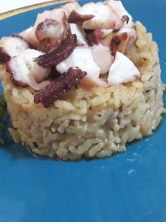 Una foto de Arroz al pesto con pulpo
