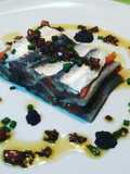 Milhoja de sardinas marinadas y tomate confitado