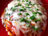 Pechuga de pollo marinada con tomate y queso