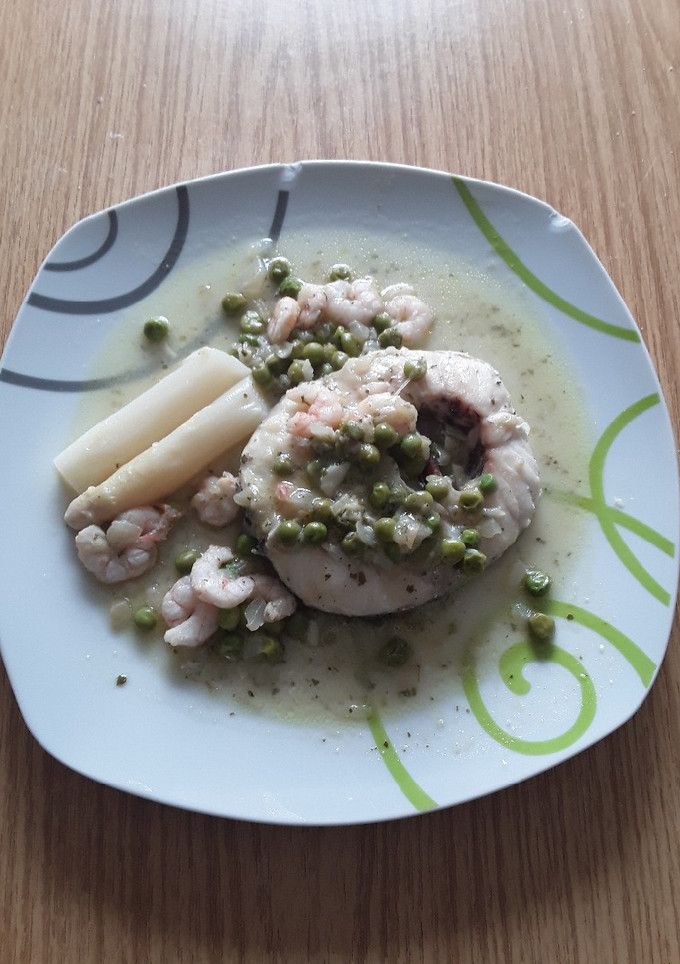 Una foto de Merluza en salsa verde