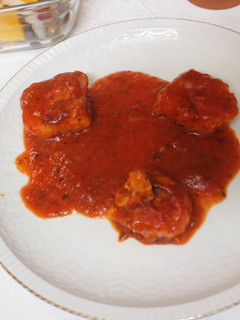Una foto de Medallones de meluza con tomate frito de bote