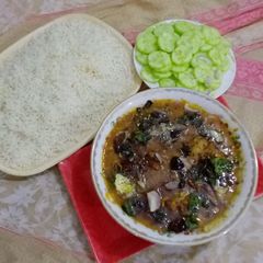 A picture of MAKHNI CHANA DAAL GOSHT & BOILED RICE.