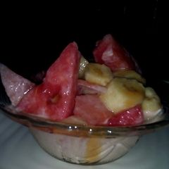A picture of 5 ingrediant fruit salad.