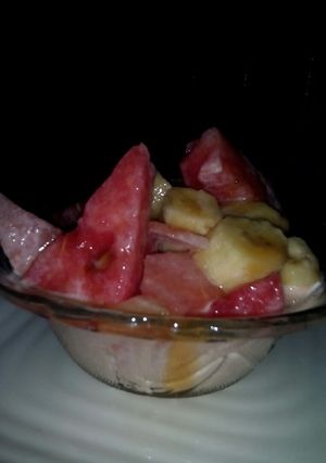 A picture of 5 ingrediant fruit salad.