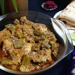 A picture of Chicken and bhindi.