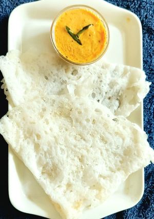 A picture of Neer Dosa with Mangalorean Tomato Chutney.