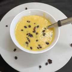 A picture of Mango Shrikhand with Blackberry.
