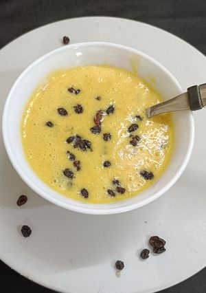 A picture of Mango Shrikhand with Blackberry.