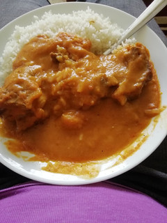 A picture of Rice and pumpkin soup.