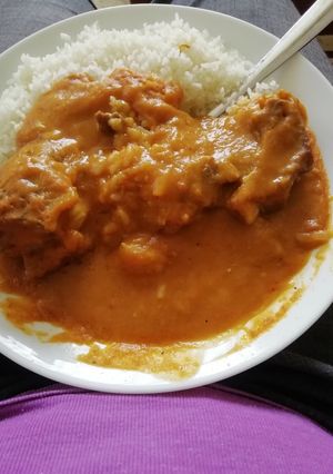 A picture of Rice and pumpkin soup.
