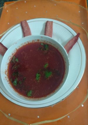 A picture of Tomato bottle gourd soup.