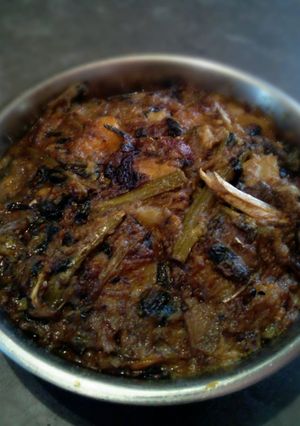 A picture of Malabar spinach fish head stir fry.