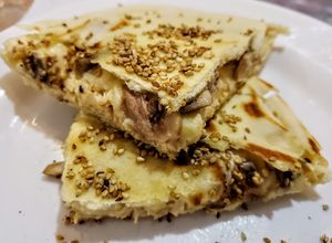 Una foto de PAN De PITA, 🌮relleno de Pollo al ajillo con Champignones...!🍄