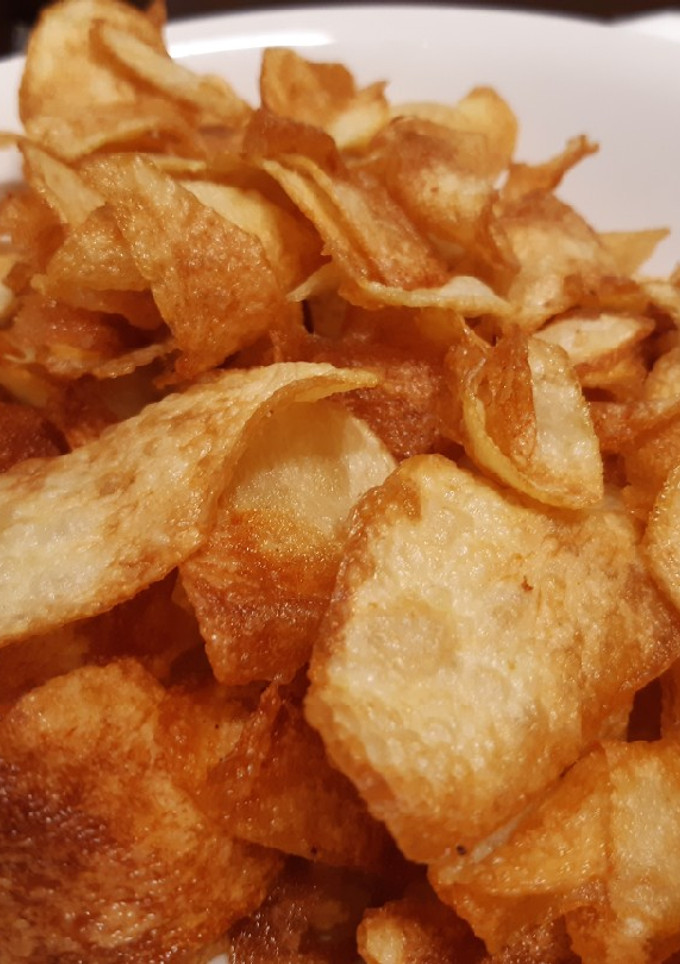 Una foto de Patatas chips artesanas