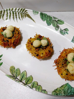 A picture of Vermicelli Nest with Paneer eggs.