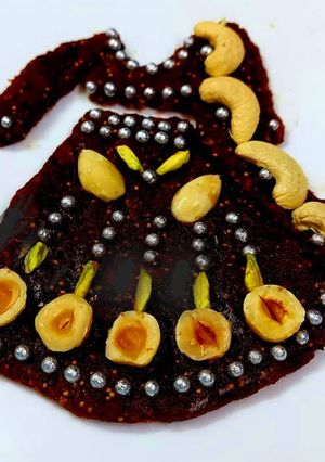 A picture of Dates And Figs Chaniya Choli Cake.