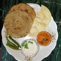 A picture of Traditional Bajra-Tomato Jugalbandi.