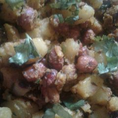A picture of Aloo and Palak sabji.