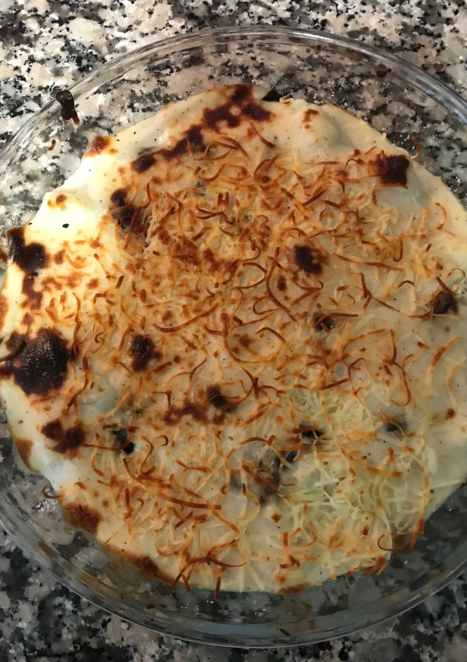 Una foto de Coliflor con ciruelas pasas y bechamel sin gluten gratinadas