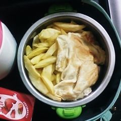 A picture of Chips and fried egg.