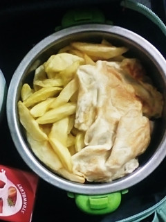 A picture of Chips and fried egg.