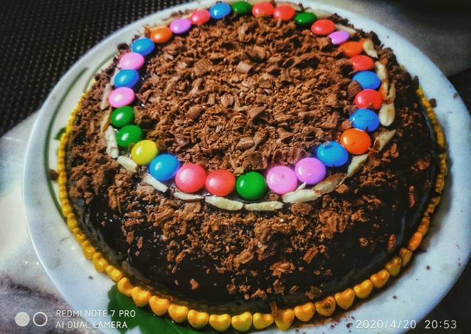 chocolate cake topped with chocolate crumbs recipe main photo