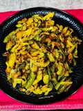 Runner beans and potato fry with onion and onion greens