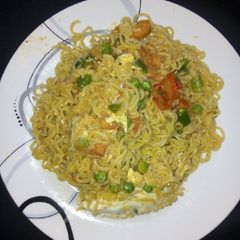 Indomie with vegetables and egg A picture of Indomie with vegetables and egg.