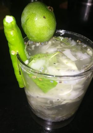 A picture of Tender coconut with mango punch.