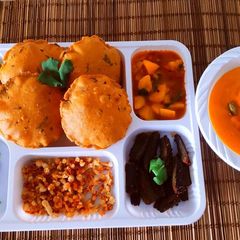A picture of Aam Rass - Methi Masala Puri Rasewale Aloo Sabji, Stuffed Bhindi Masala, Fries and Pickle 😋.