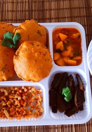 A picture of Aam Rass - Methi Masala Puri Rasewale Aloo Sabji, Stuffed Bhindi Masala, Fries and Pickle 😋.