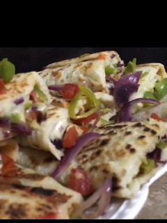 A picture of Chicken Tikka Pizza Rolls.